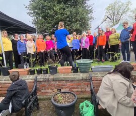 Ashtones Community Choir performing Freedom is Coming in Ashton Park Preston